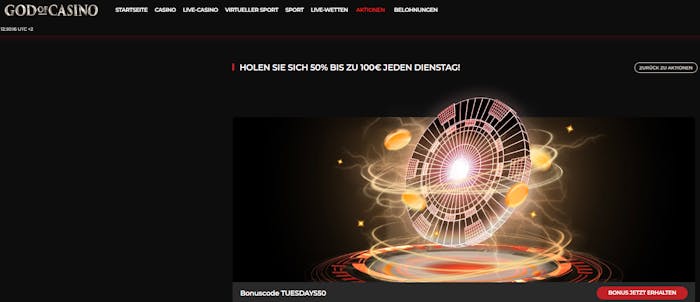 Gomblingo Casino Screenshot mit dem Bonus Code Angebot. Das Desigin ist schwarz gehalten, zu sehen ist in der Mitte ein Roulette Rad mit Casino Chips.