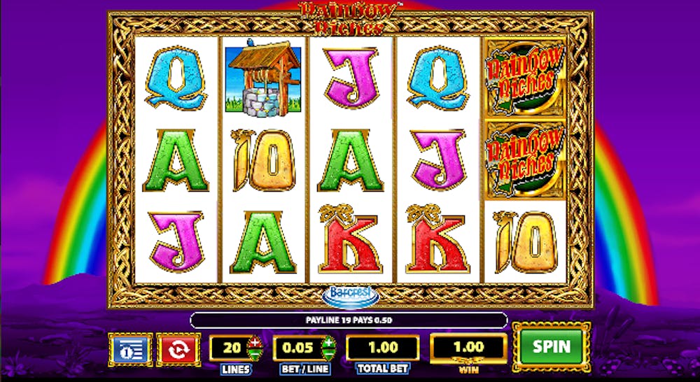 Ein Screenshot aus dem Spiel Rainbow Riches Frespins mit vielen verschiedenen Symbolen auf den Gewinnlinien