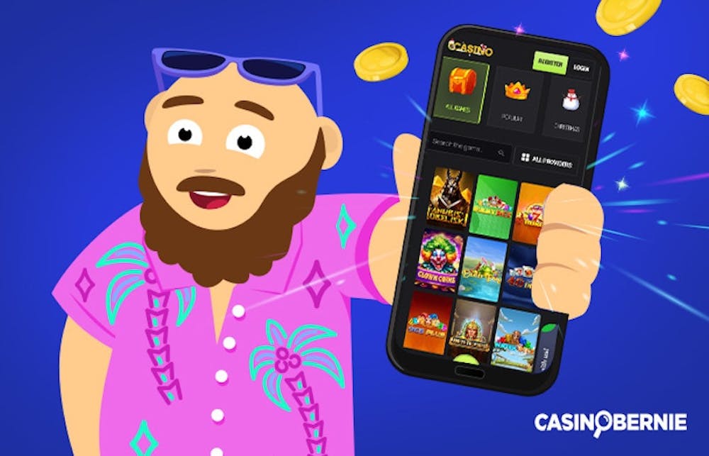 CasinoBernie mit Smartphone, das Spiellobby in neuem Casino online zeigt